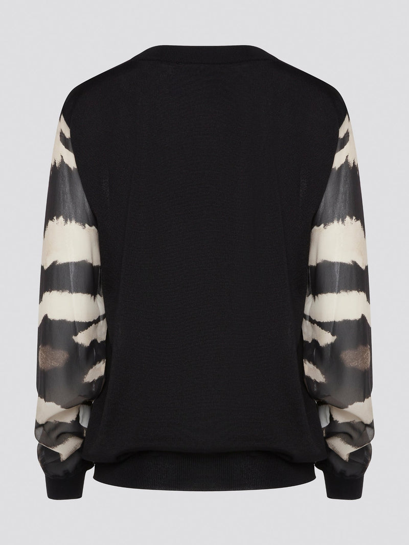 Make a fierce fashion statement with the Roberto Cavalli Zebra Print Sweatshirt, featuring a bold and eye-catching zebra print design. Crafted from premium materials, this sweatshirt offers both style and comfort for all-day wear. Elevate your street style with this standout piece that is sure to turn heads wherever you go.