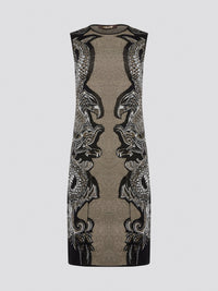 Elevate your wardrobe with the exquisite Knitted Bodycon Dress by Roberto Cavalli. Crafted with precision and care, this dress features intricate knitted details that hug your curves in all the right places. Make a statement at any event with this luxurious and unique piece that exudes elegance and style.