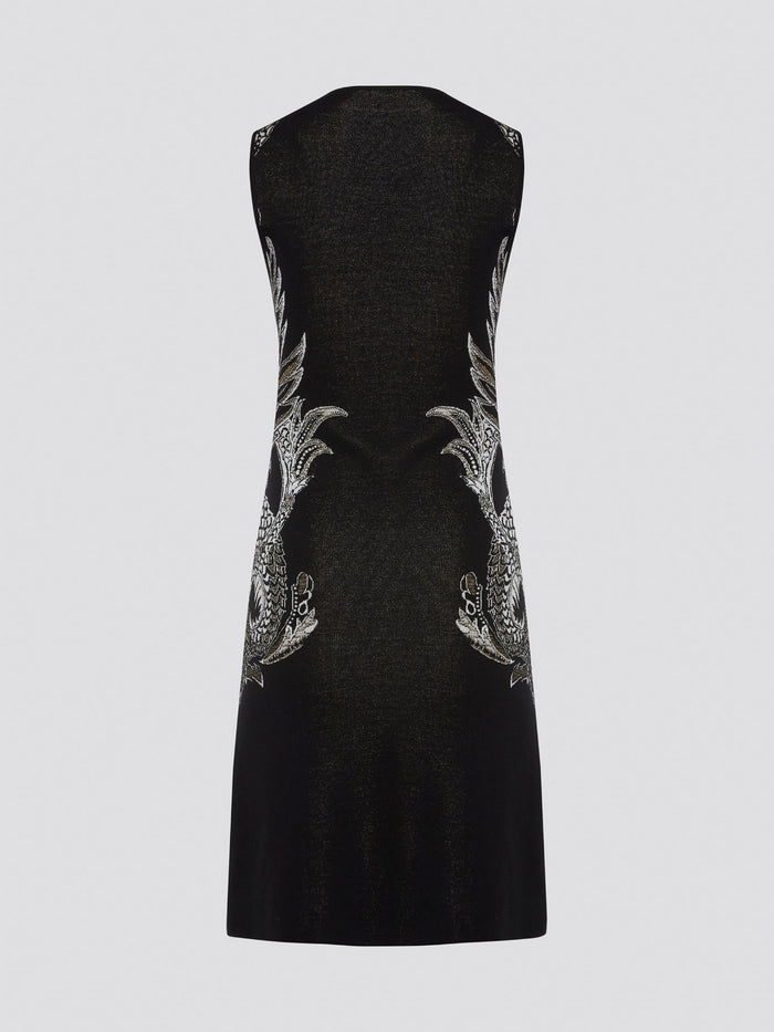 Elevate your wardrobe with the exquisite Knitted Bodycon Dress by Roberto Cavalli. Crafted with precision and care, this dress features intricate knitted details that hug your curves in all the right places. Make a statement at any event with this luxurious and unique piece that exudes elegance and style.