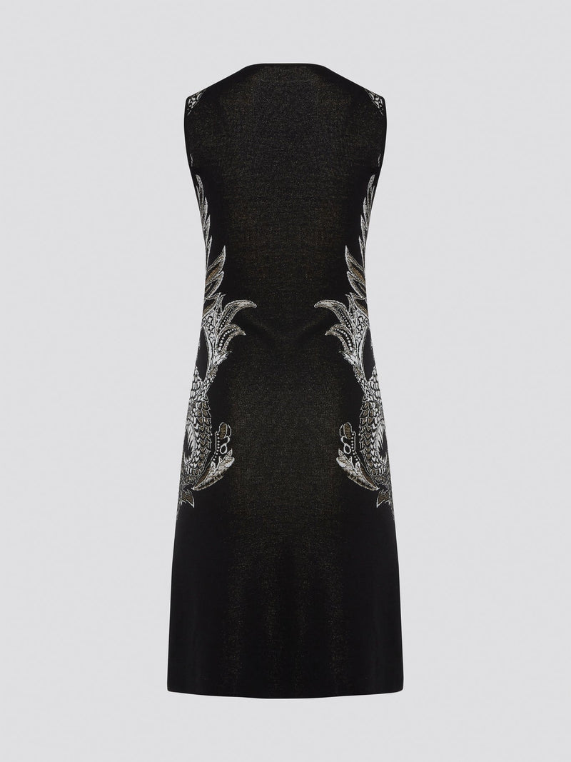 Elevate your wardrobe with the exquisite Knitted Bodycon Dress by Roberto Cavalli. Crafted with precision and care, this dress features intricate knitted details that hug your curves in all the right places. Make a statement at any event with this luxurious and unique piece that exudes elegance and style.