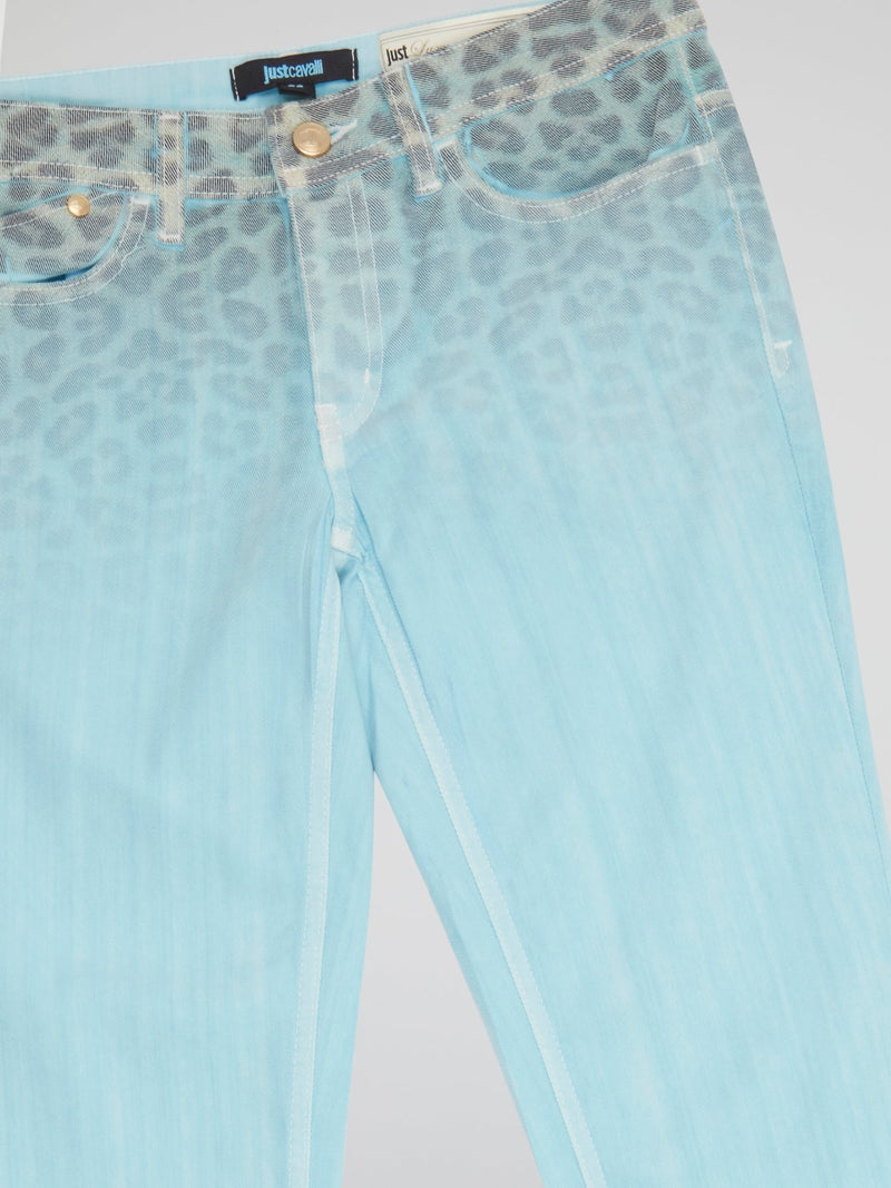 Unleash your wild side with these Blue Leopard Gradient Pants by Just Cavalli. Crafted from luxurious fabric that hugs your curves in all the right places, these pants feature a mesmerizing gradient pattern that transitions from deep indigo to fierce leopard print. Step out in style and make a statement with these bold and trendy pants that are sure to turn heads wherever you go.