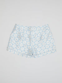 Transport yourself to a whimsical garden with these Blue Floral Print Shorts by Parosh. Made from luxurious fabric, these shorts feature a vibrant blue hue adorned with intricate floral designs for a statement-making look. Perfect for exploring the city or lounging in the sun, these shorts are a must-have addition to your wardrobe.