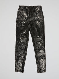 Unleash your wild side with our Black Reptilian Leather PantsIceberg, designed to make a bold statement. Crafted from high-quality faux leather with a sleek reptile texture, these pants are perfect for standing out in a crowd. Embrace your inner rockstar and take your style to the next level with these edgy and stylish pants.