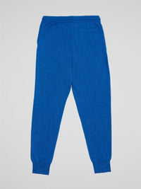 Elevate your casual style with these effortlessly chic Blue Drawstring Cuffed Pants by Markus Lupfer. Made from premium materials, these pants feature a flattering drawstring waist and trendy cuffed ankles for a modern twist on a classic silhouette. Perfect for a day out or a cozy night in, these versatile pants will quickly become a wardrobe staple.