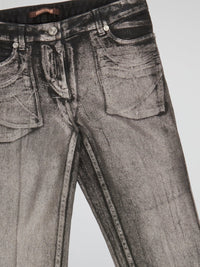 Add a touch of retro glam to your wardrobe with these Grey Acid Wash Flared Jeans by Roberto Cavalli. The unique acid wash design gives these jeans a modern edge, while the flared silhouette adds a hint of 70's flair. Perfect for pairing with a graphic tee and platform heels for a trendy, statement look.
