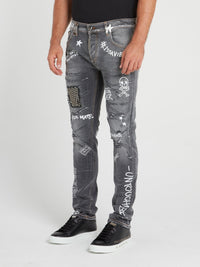 Grey Patched Graffiti Jeans